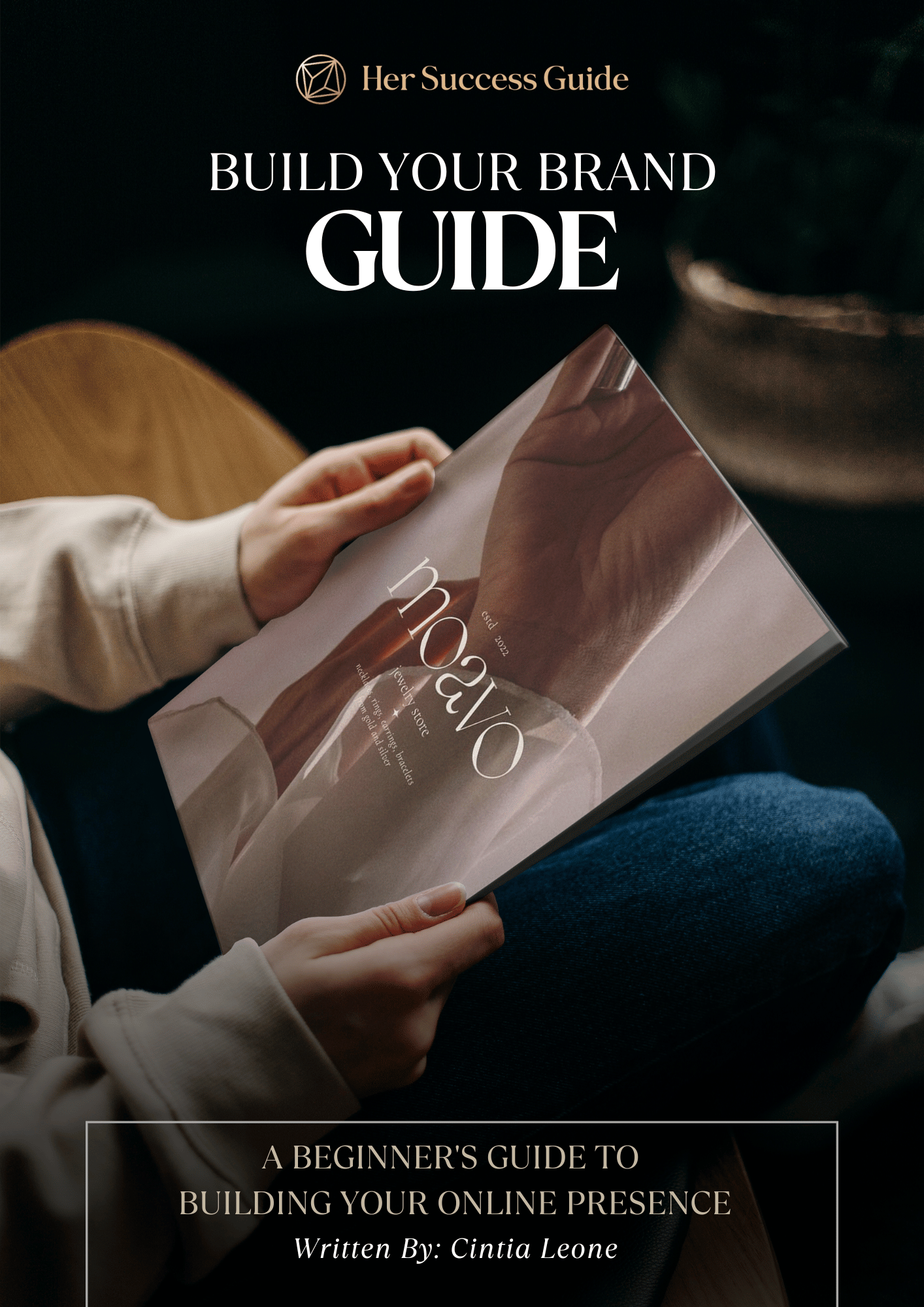 Cover of an ebook - showing a person holding a magazine. The cover says: A guide to build your brand - Building your online Presence. 